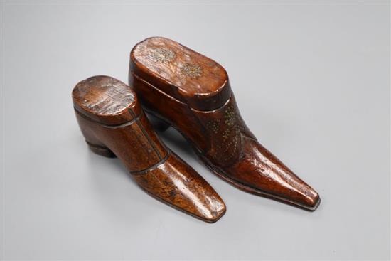 A 19th century mahogany snuff shoe and a model shoe, largest 10cm